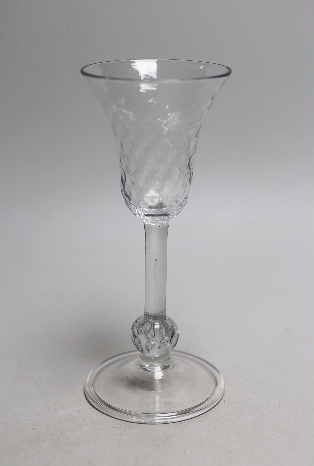 A Georgian honeycomb moulded wine glass, 19.5cms high